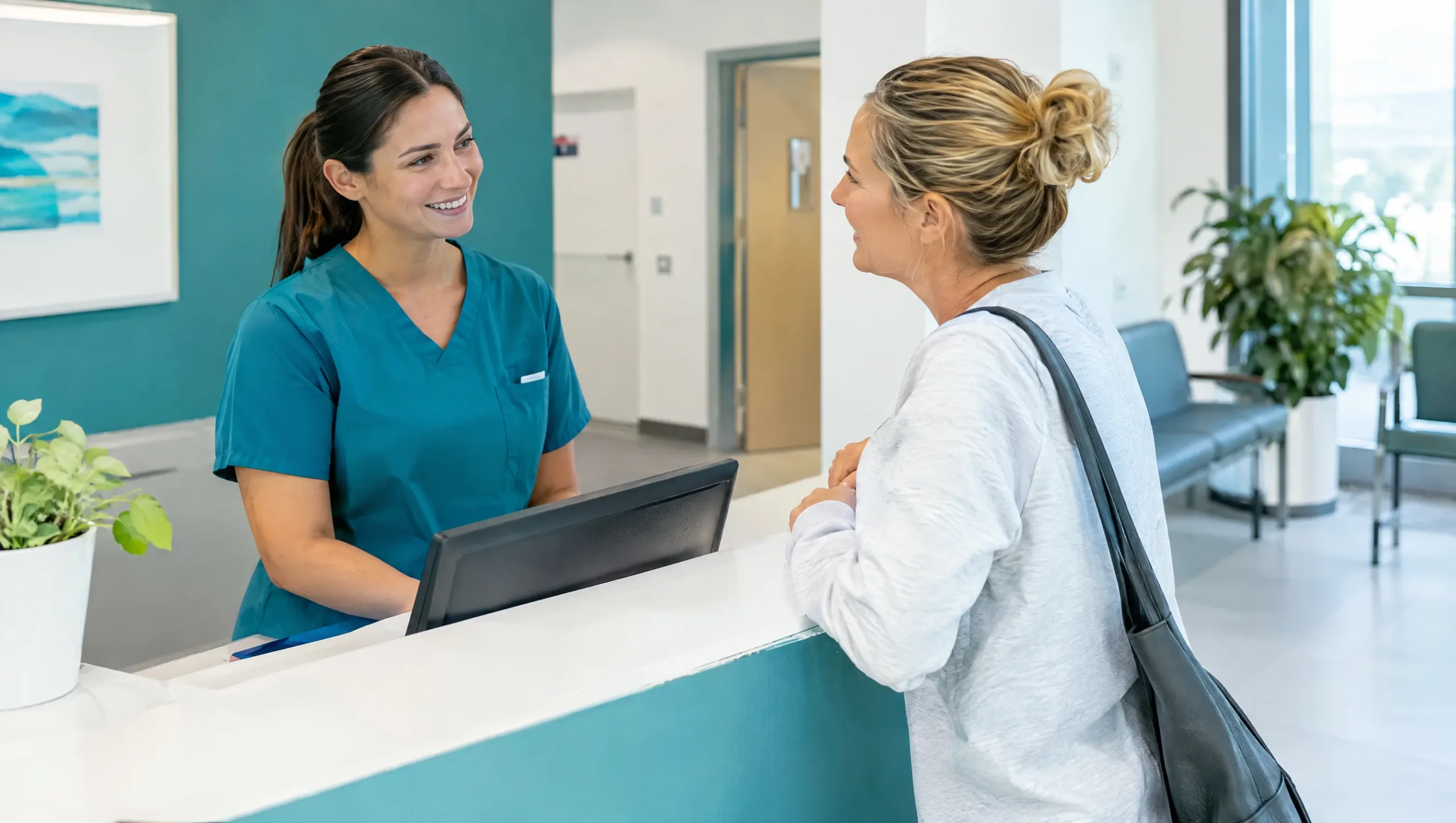 Patient asking physiotherapist frequently asked questions about sciatica and disc pain