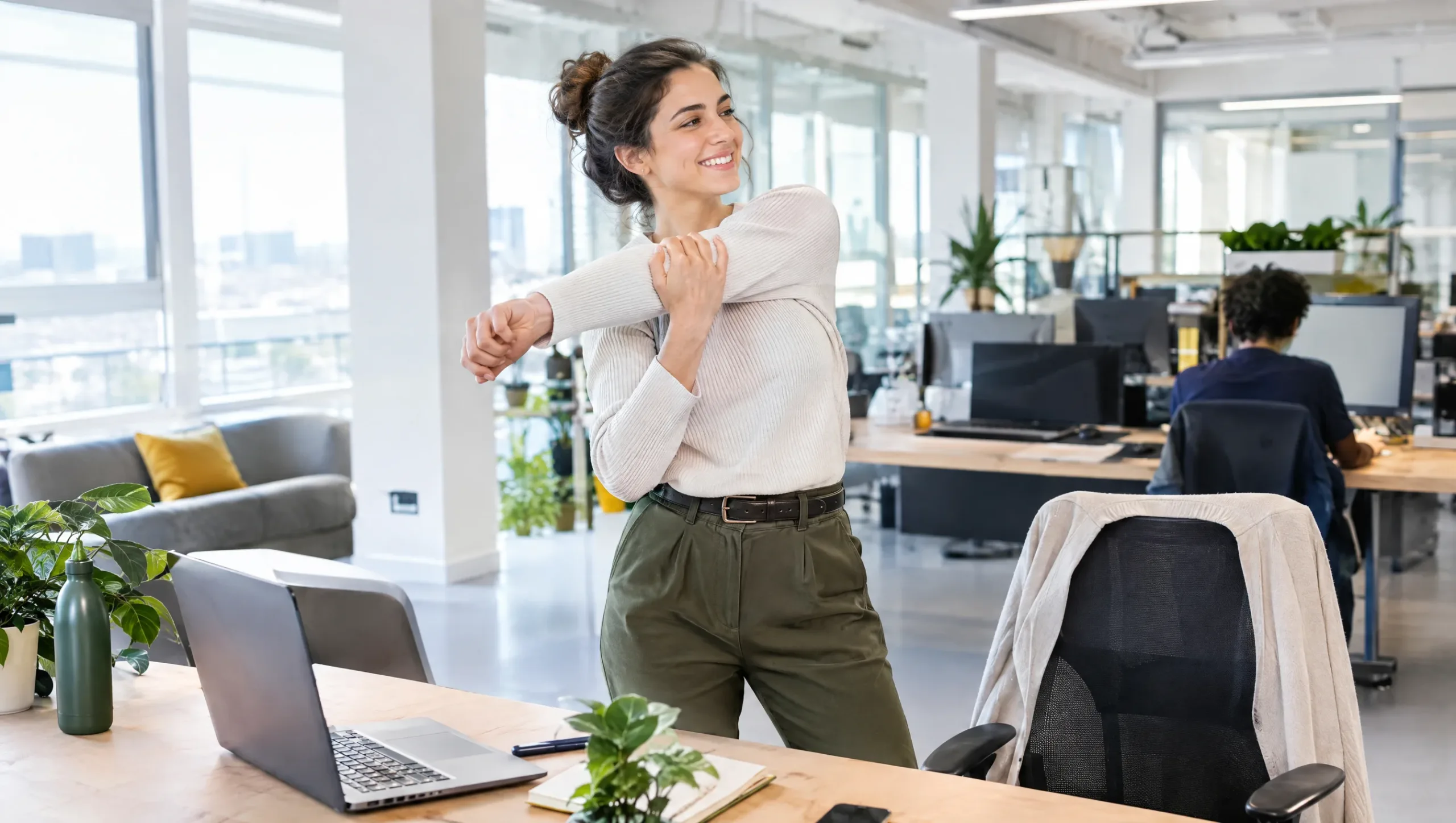 IT professional taking a standing movement break using the 20-20-20 rule