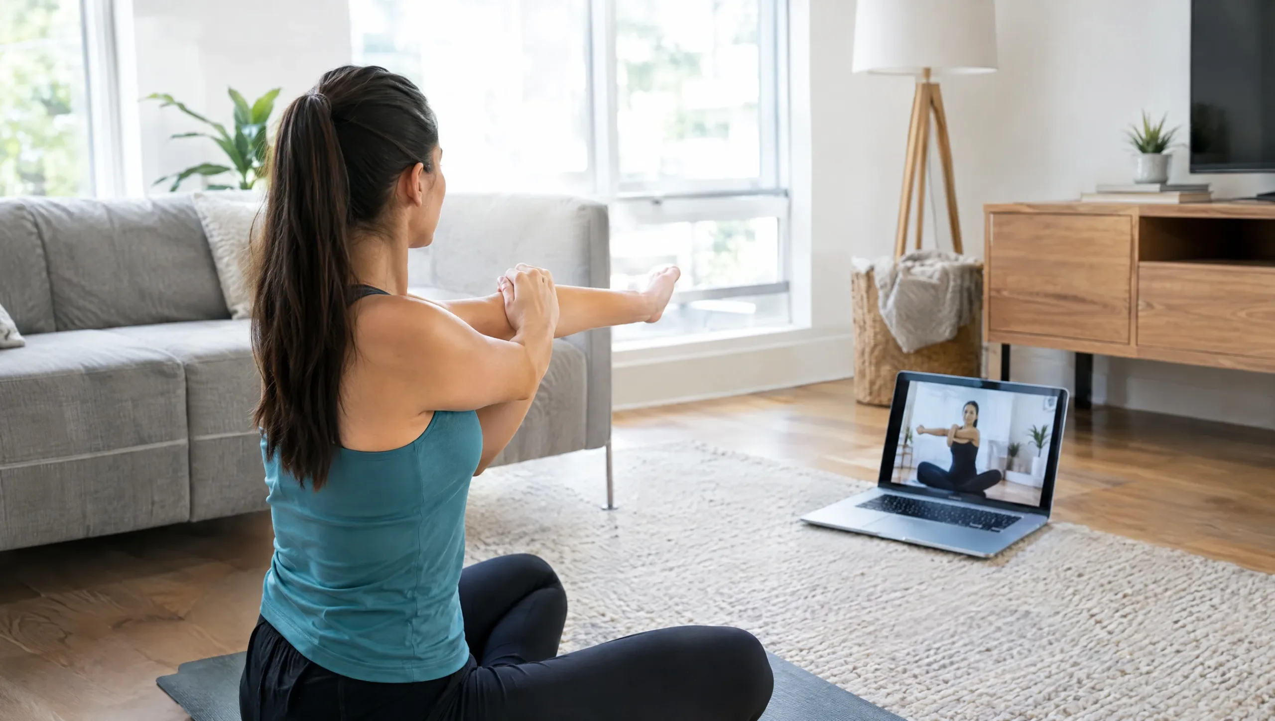 Patient doing guided home exercise program during virtual physiotherapy session